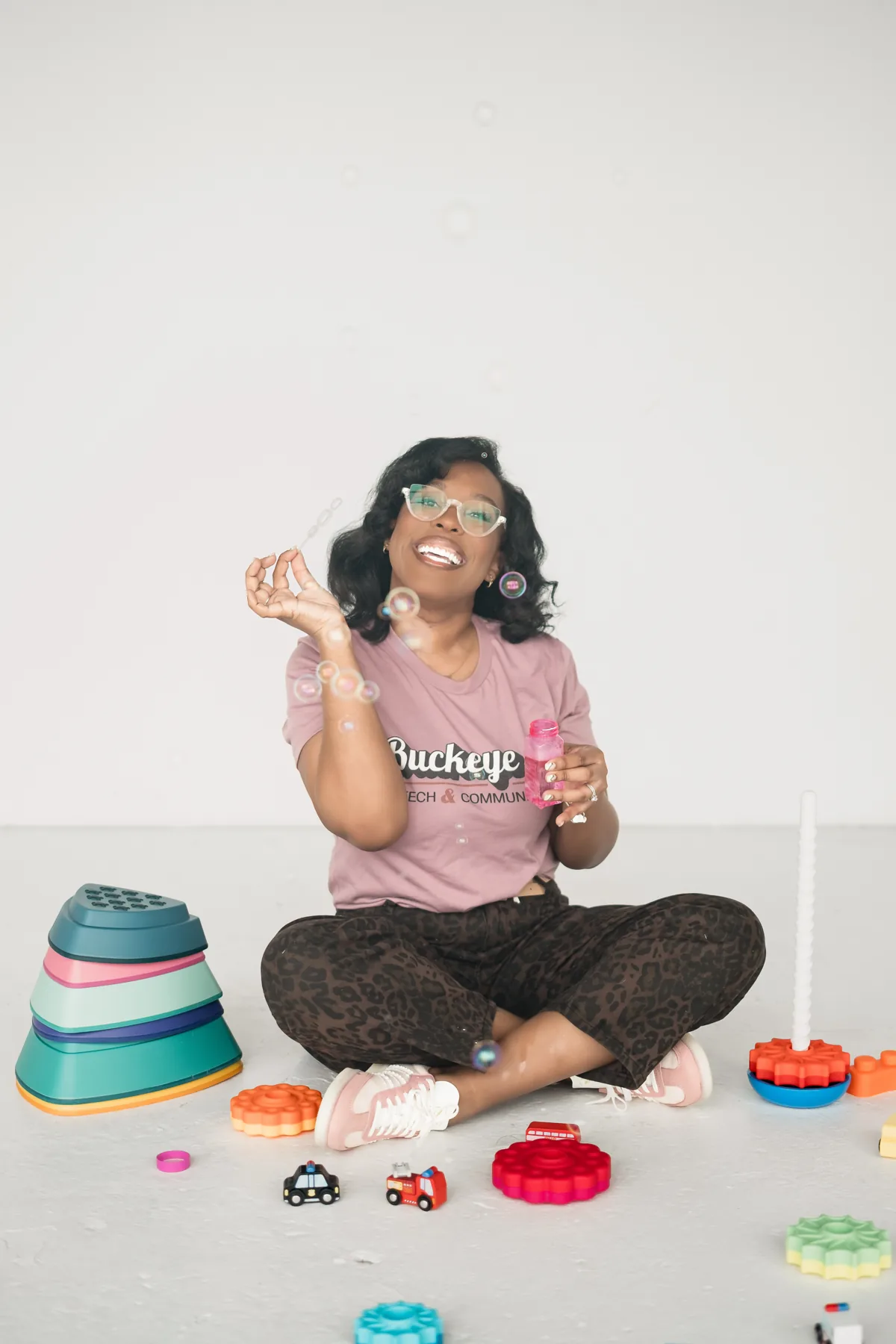 Cara Falade using bubbles during play-based therapy