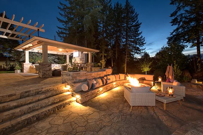 Low voltage landscape lighting installed near outdoor plants