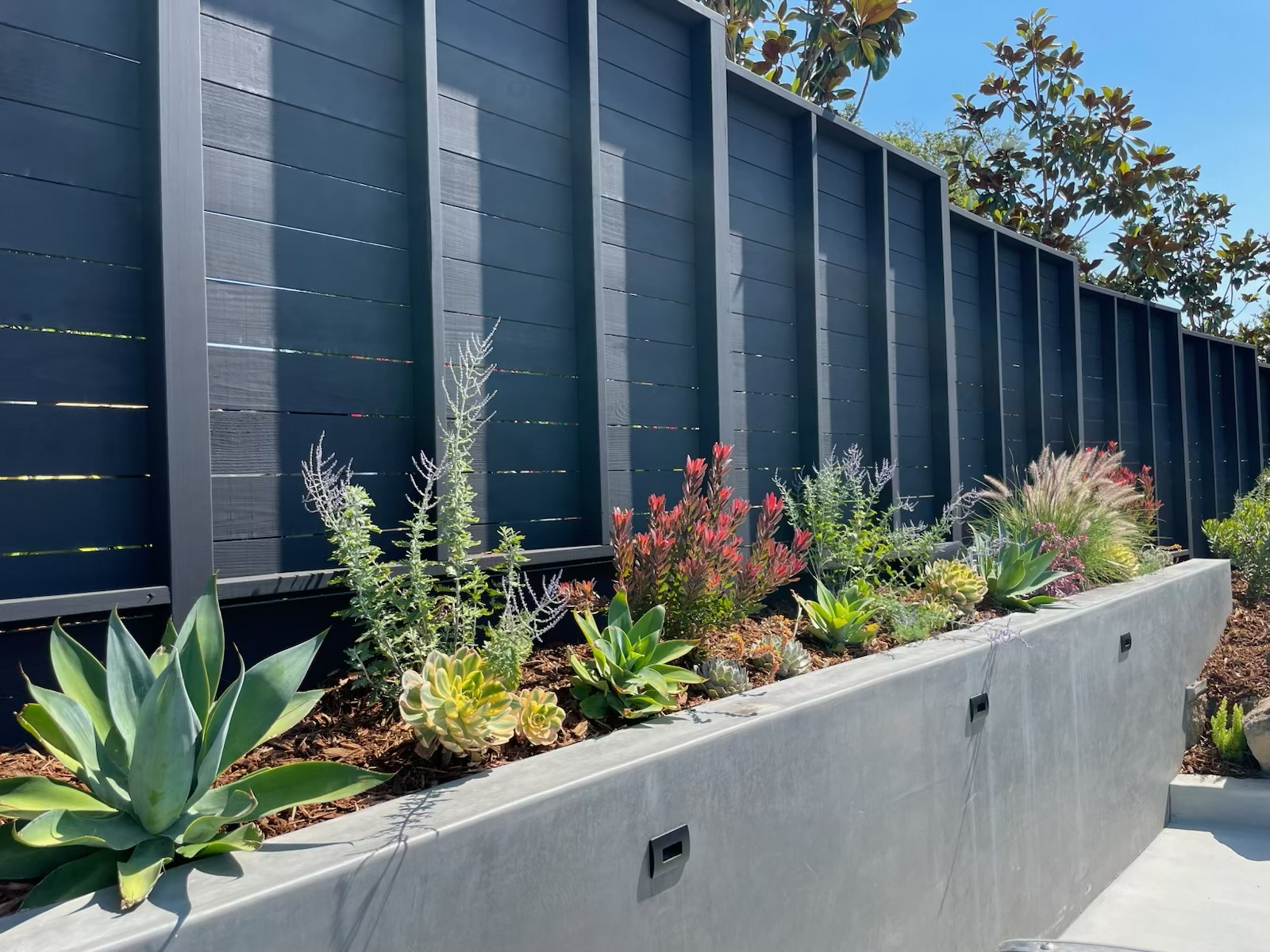 Outdoor living space by Groundbreaking Landscapes