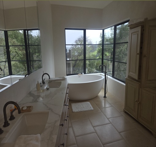 9 Greenfield Way St Helena bathroom with tub and double vanity