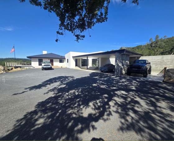 Greenfield Way St Helena exterior courtyard with trees and vehicles