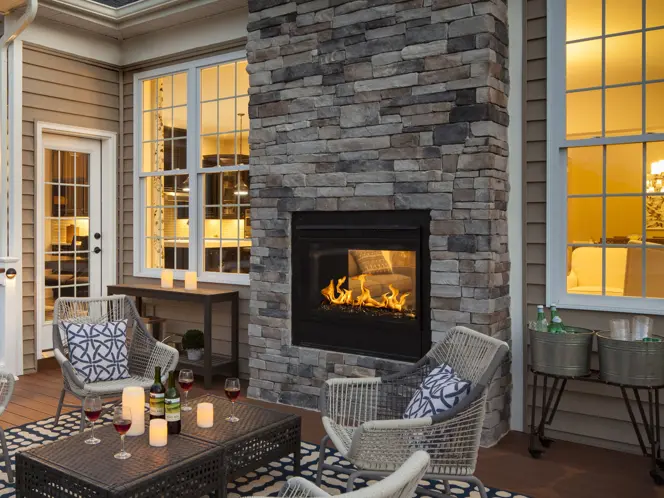 Majestic outdoor fireplace on a modern patio