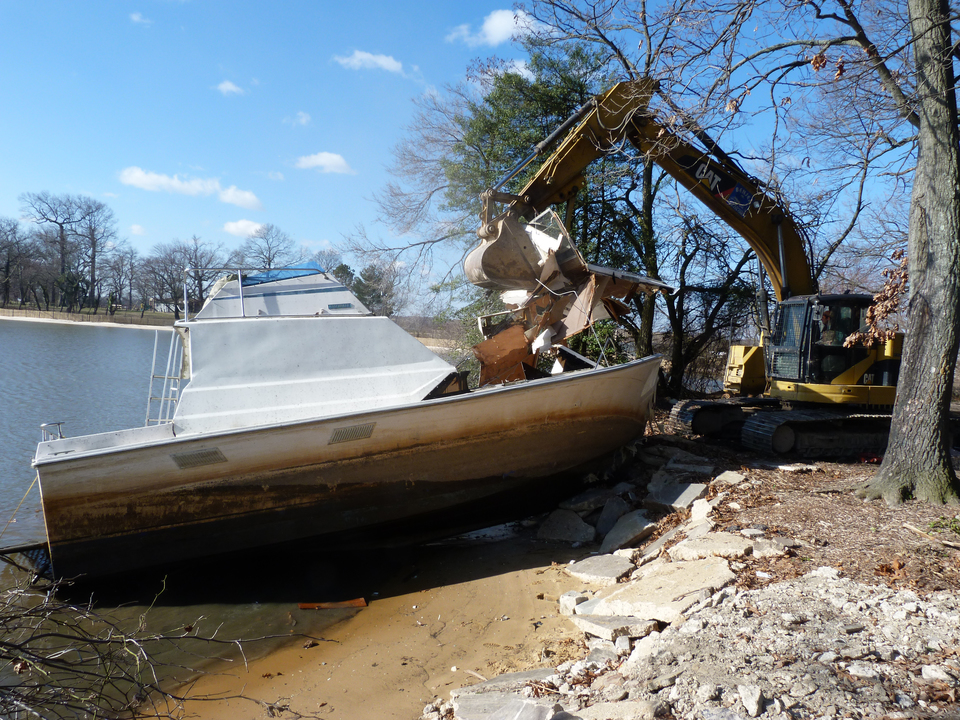 An abandoned boat, found in the water off of Chesaco Road in Rosedale, was broken up and disposed of on March 14. Photo by Devin Crum. BRRC disposes of abandoned boats, returns to Grays Road for second cleanup