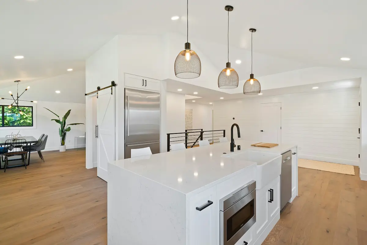 Beautifully designed modern kitchen with custom cabinetry and stone countertops