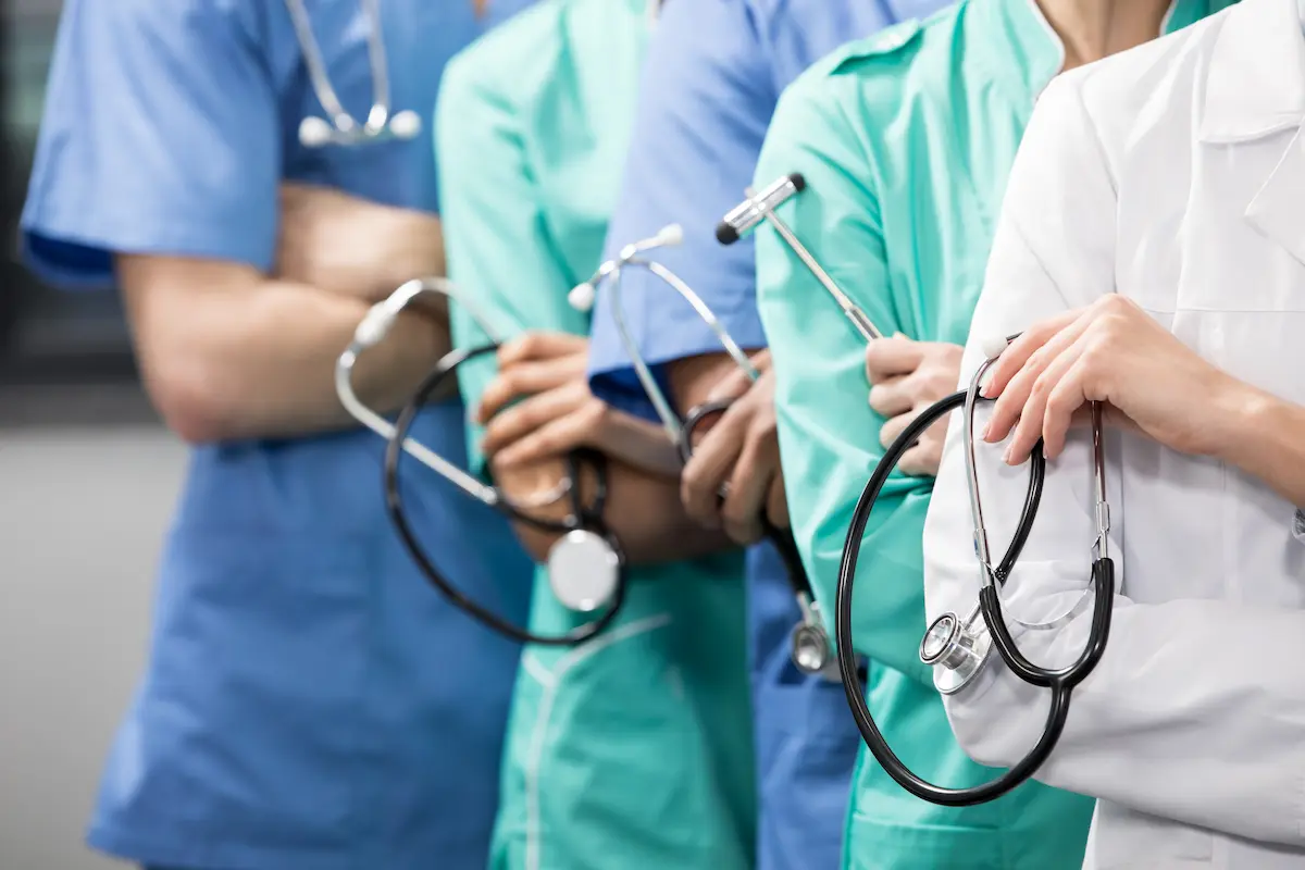 Medical professionals working in a modern clinical laboratory environment