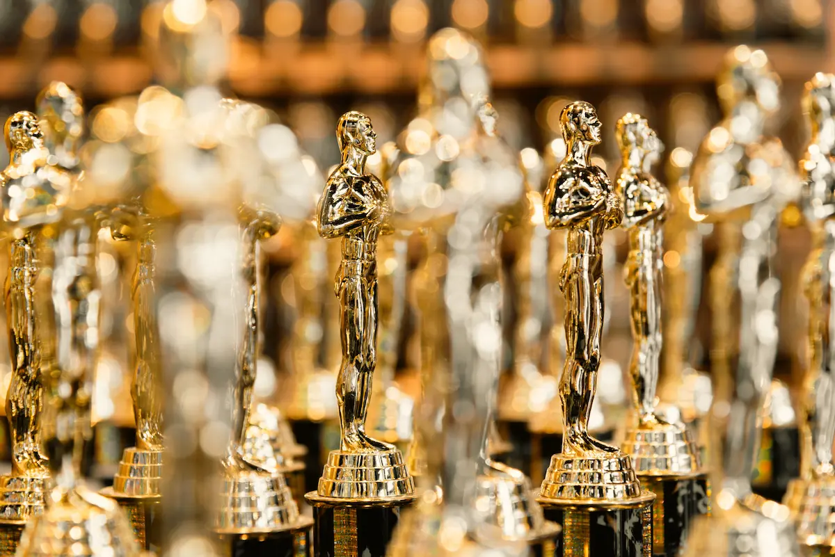 Close shot of a golden award statue trophy replica representing recognition and achievement