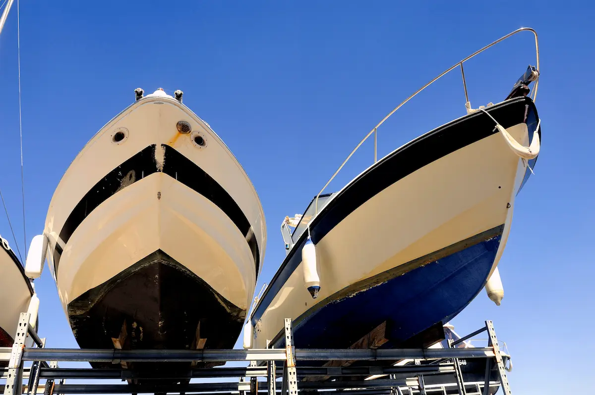 Marina storage yard with boats on stands representing a boat repair and marine service facility
