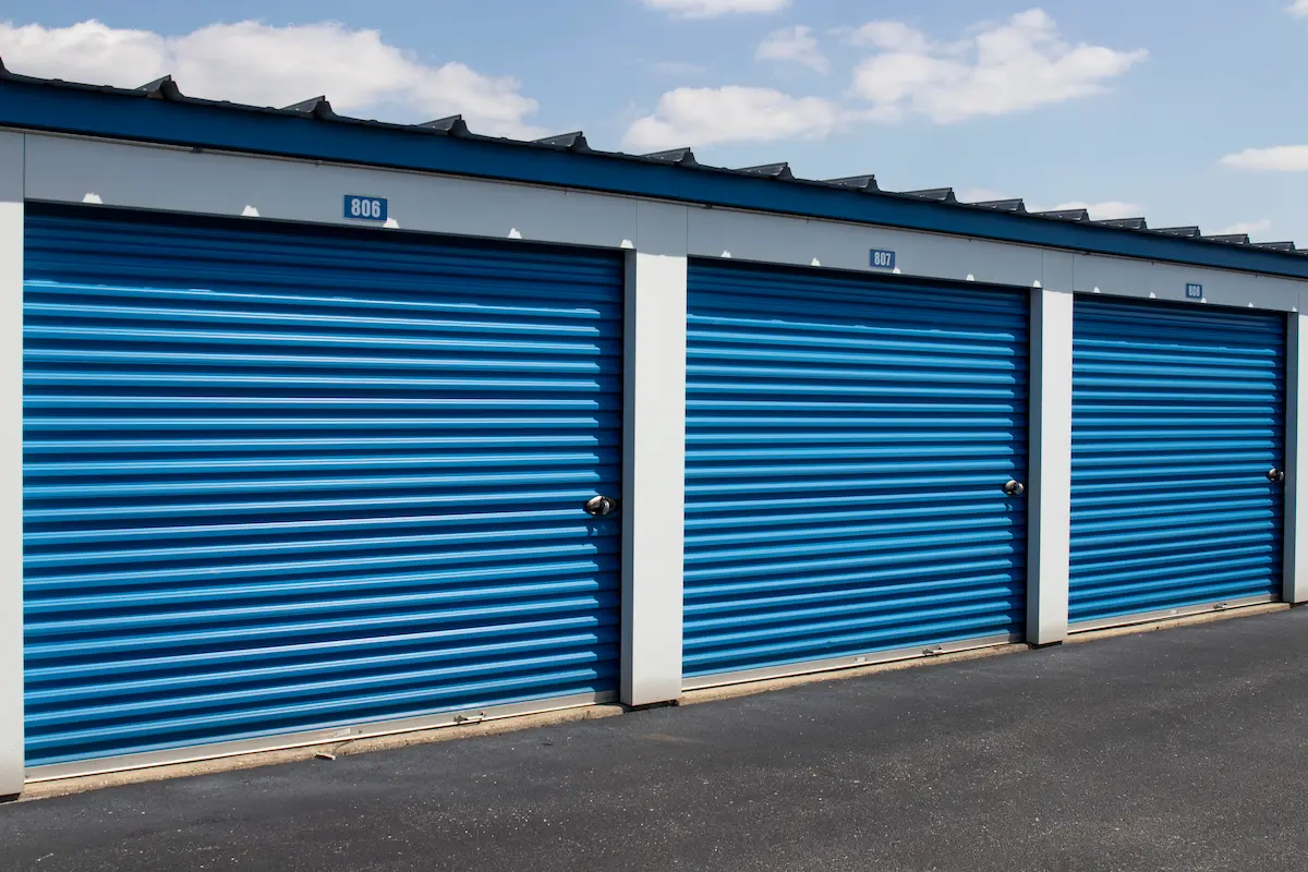 Rows of self storage and mini storage garage units at a secure storage facility