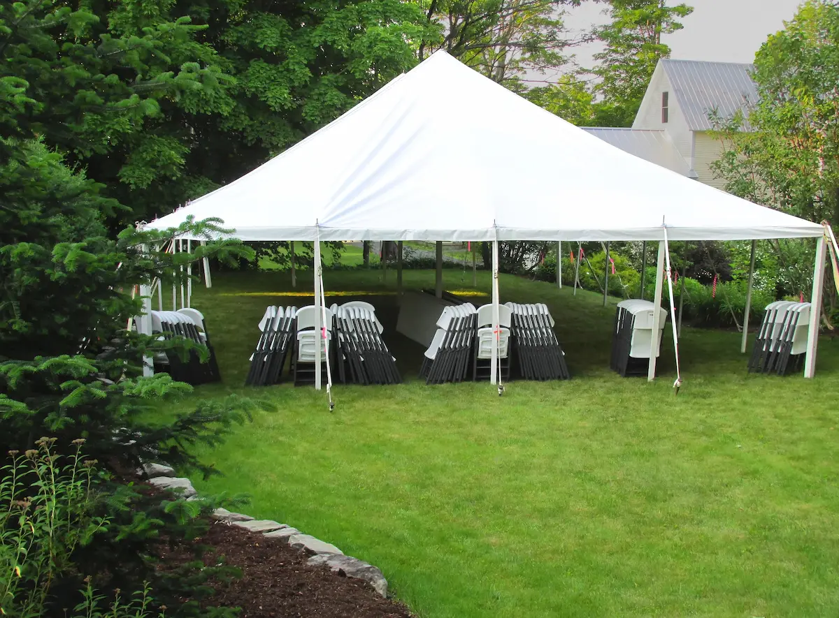 A large white commercial events tent representing the professional quality fabric structures and custom tent manufacturing that a skilled tent manufacturer produces for event rental companies, hospitality operators, and institutional buyers