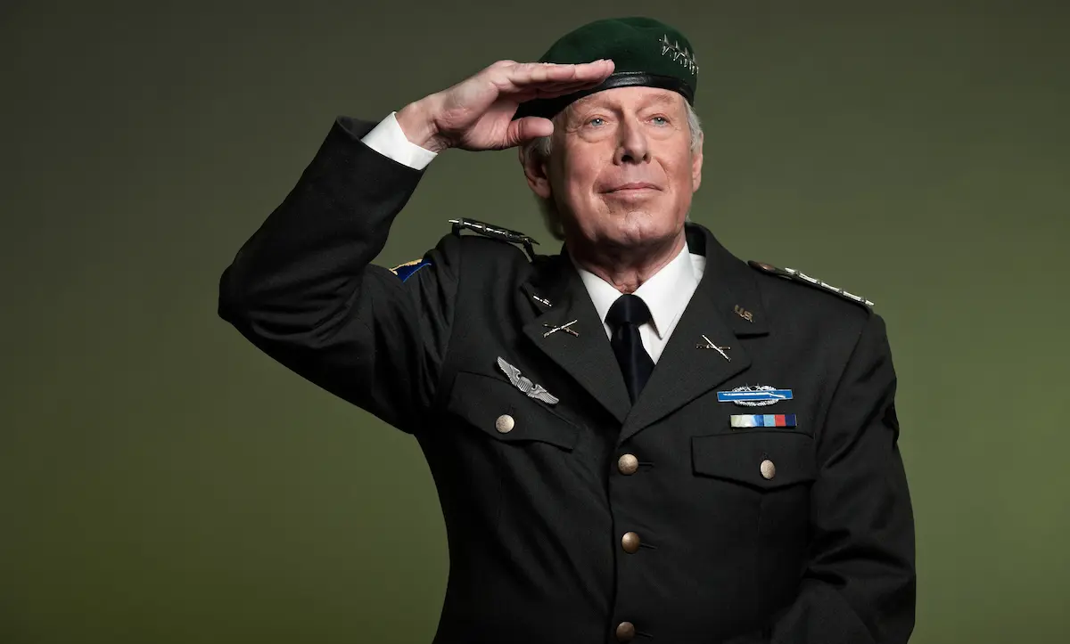 A military general in uniform wearing a beret giving a salute representing the honor, service, and dedication to country that every veterans service organization works to support and recognize through its programs, advocacy, and community presence