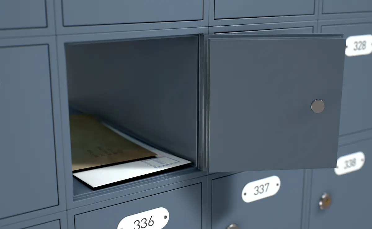 A wall of professional post office boxes with numbered metal doors representing the secure mail receipt, organized mail management, and professional business address services that a virtual mailbox company provides to remote business owners, digital nomads, and LLC formation clients