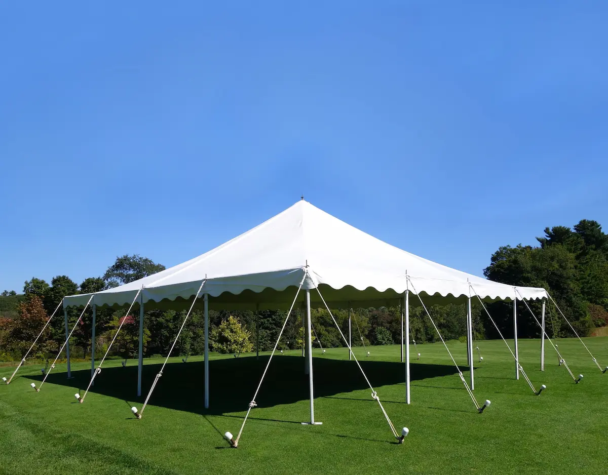 A large white professional events tent structure representing the heavy-duty coated and laminated fabric materials used in commercial tent manufacturing, outdoor event structures, and industrial fabric applications where performance, durability, and weather resistance are critical material requirements