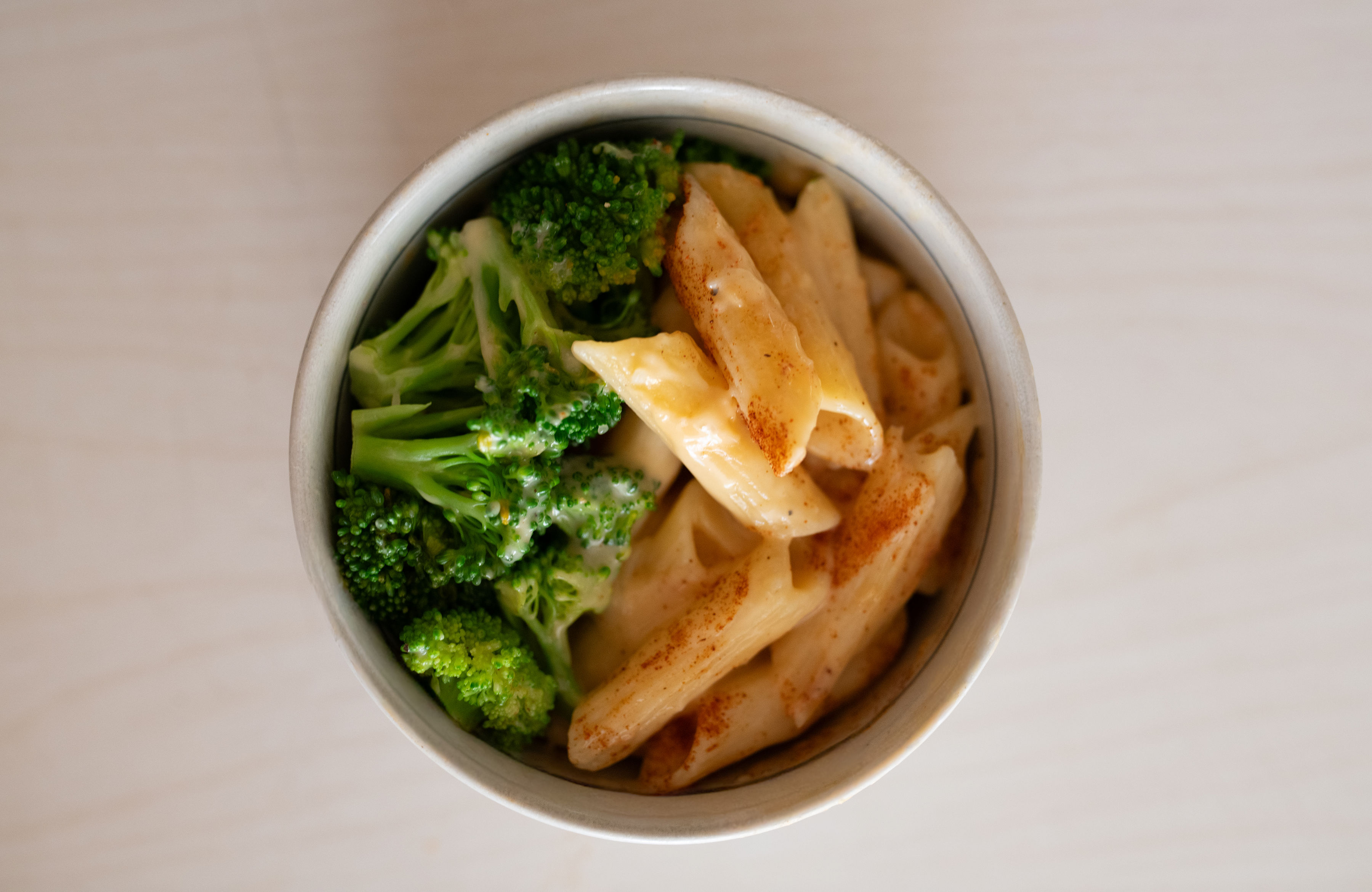 Creamy high-protein mac and cheese with a side of broccoli